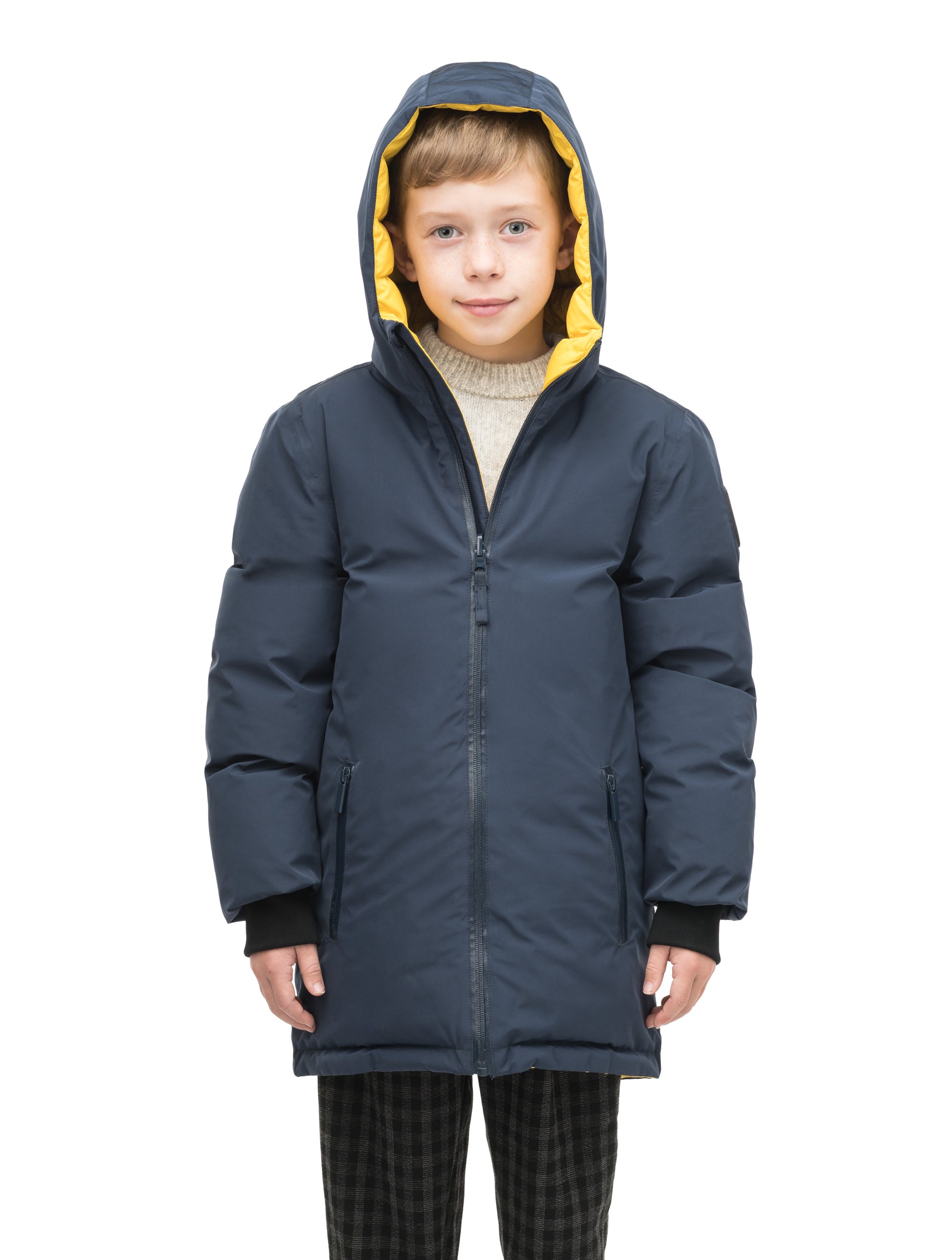 Kids' reversible knee length, down filled parka with waterproof finish in Marine/Citron